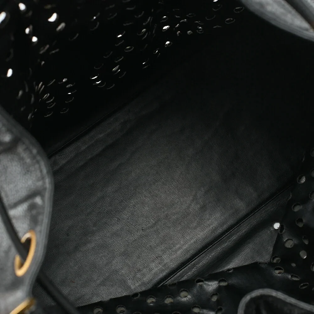 Authentic CHANEL Black caviar perforated bucket drawstring with removable pouch